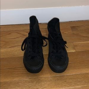 All black high top Converse